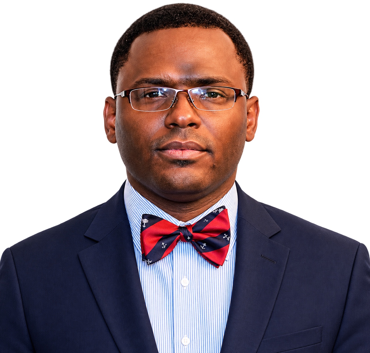 Portrait of Jermaine E. Whiteside in navy suit and bow tie